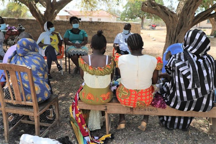 The KDIC team meet with some of the beneficiaries during a tour of the region