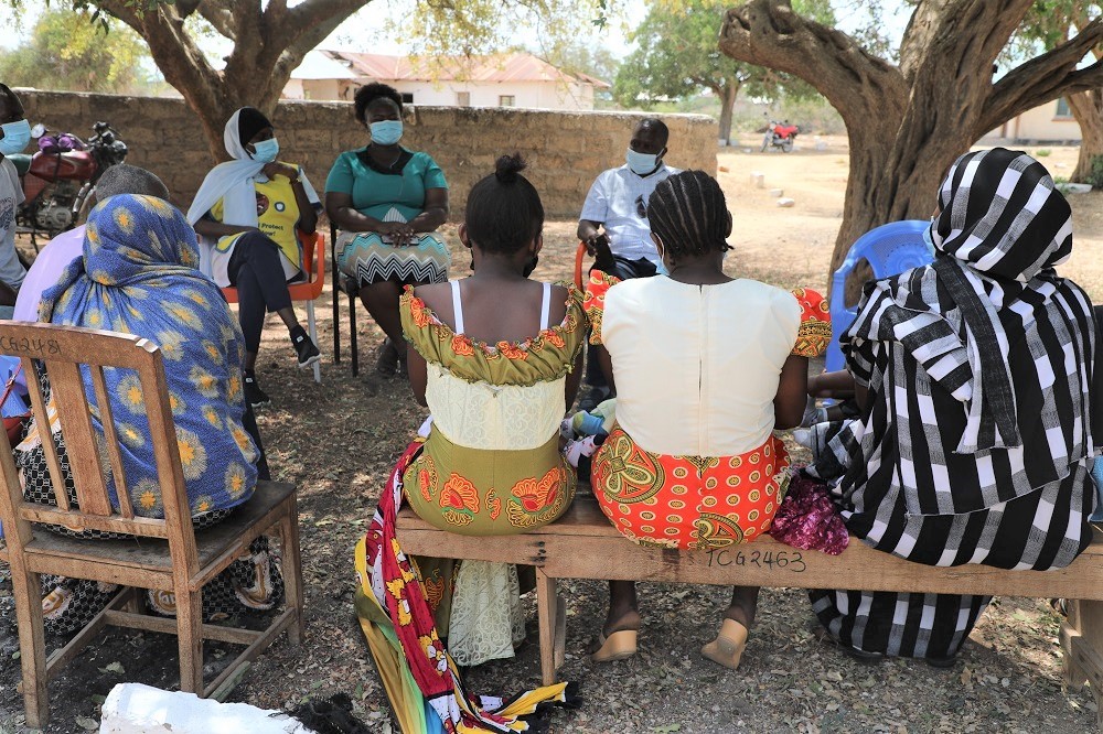 The KDIC team meet with some of the beneficiaries during a tour of the region